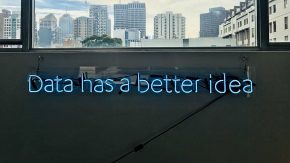 neon sign that says data has a better idea
