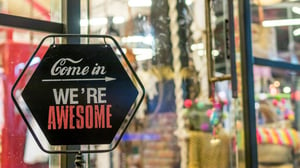 small business saturday sign that says come in, we're awesome